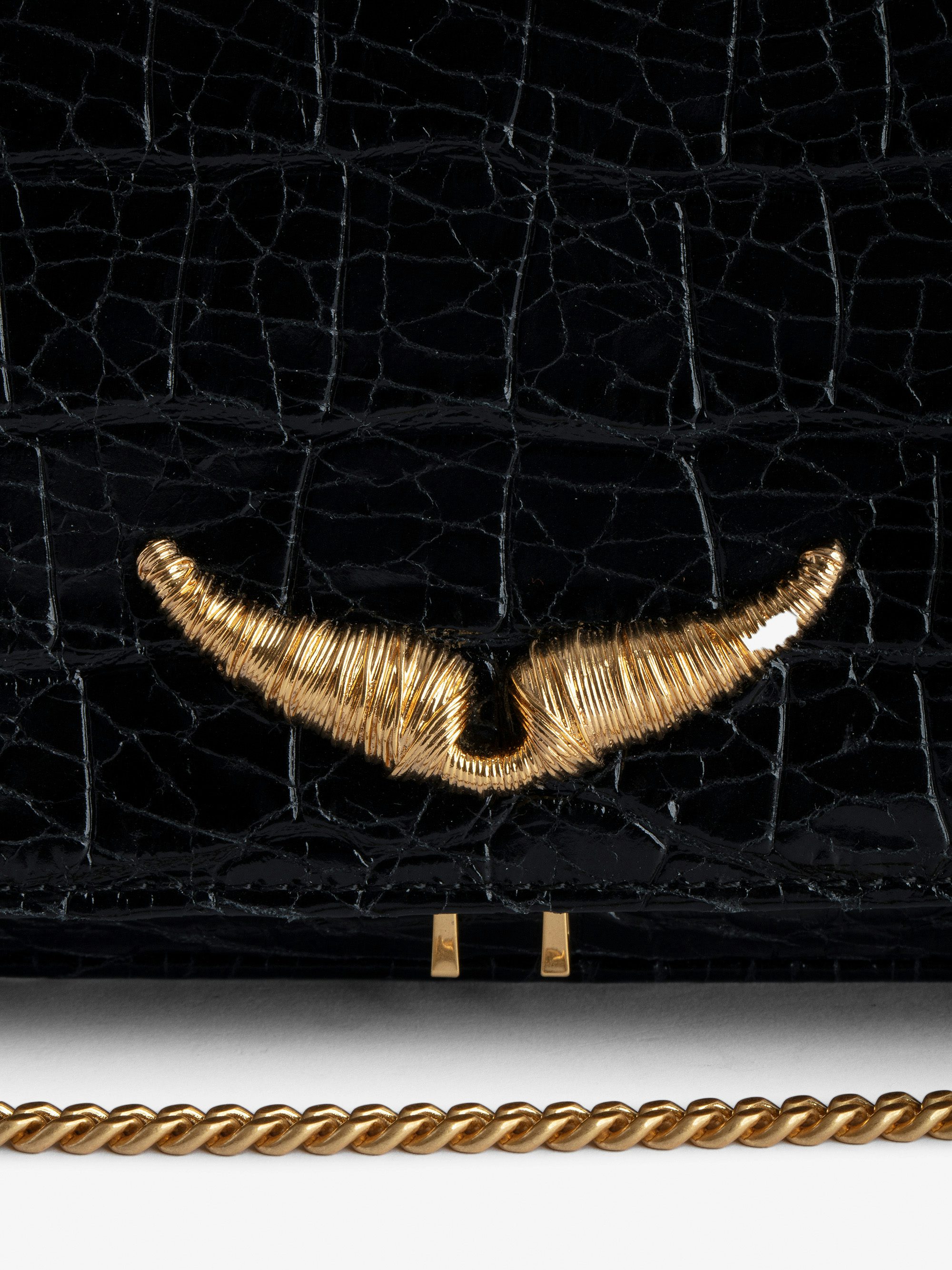 Rock Goossens Embossed Clutch - Zadig&Voltaire has called upon the expertise of the art house GOOSSENS to highlight its emblematic wings on its iconic bag: the ROCK clutch.